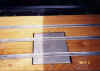 new_stainless_steel_strips_and_cover_on_treated_varnished_oak_floor_wow.JPG (48237 bytes)